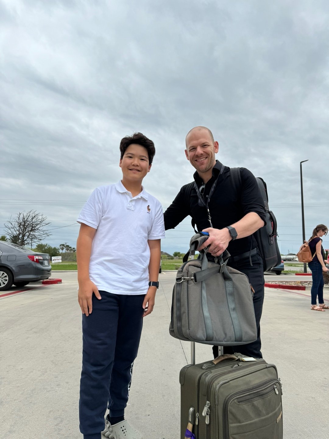 Student with trumpet clinician outside after NTC 2024