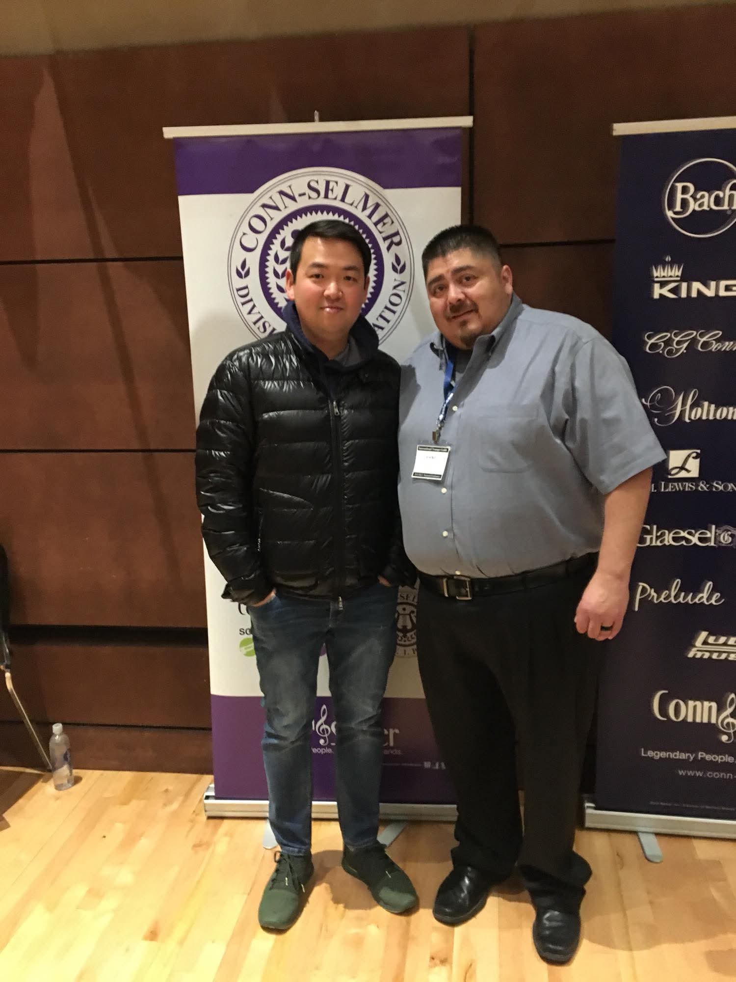 Matthew Kim with Conn-Selmer representative at convention