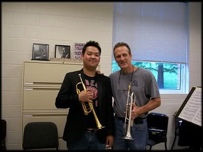 Matthew Kim with trumpet player colleague