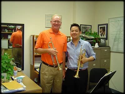 Matthew Kim with trumpet player colleague