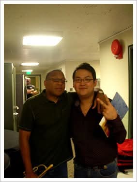 Matthew Kim with trumpet artist backstage